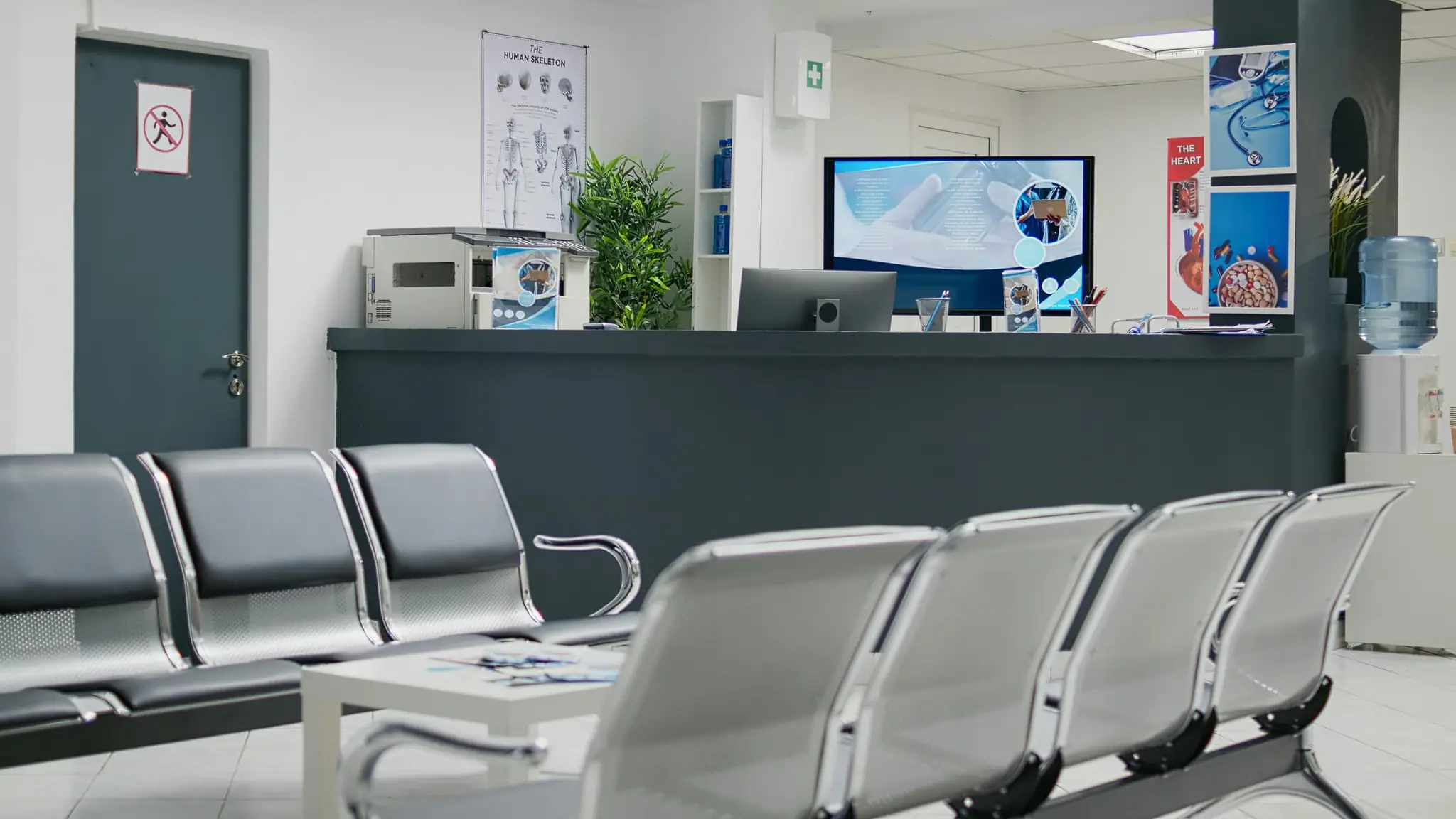 Administrative professional taking a call at a desk
